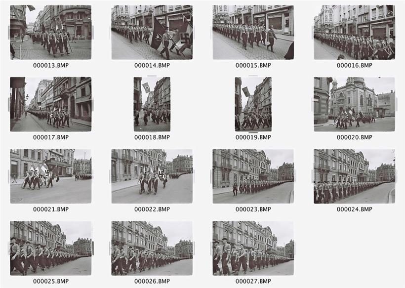 20. April 1941: Die „Luxemburger Volksjugend“ marschiert in Hitler-Jugend-Uniformen vom Limpertsberg an der Synagoge vorbei (Neg. 20) bis zum Arbed-Gebäude, dem Hauptsitz des Gauleiters
