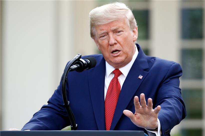 29.03.2020, USA, Washington: Donald Trump, Präsident der USA, spricht über das Coronavirus im Rosengarten des Weißen Hauses. Foto: Patrick Semansky/AP/dpa +++ dpa-Bildfunk +++
