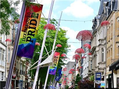 Logo der Luxembourg Pride 2026 mit wechselndem Veranstaltungsort Luxemburg-Stadt und Esch für LGBTQ+ Events