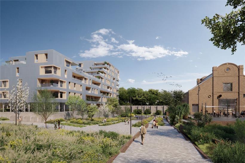 Alt neben neu: „Liicht“ heißt das Gebäude links im Bild, das ab 2024 neben dem alten Industriegebäude gebaut wird. 2026 sollen dort die ersten Bewohner einziehen.
