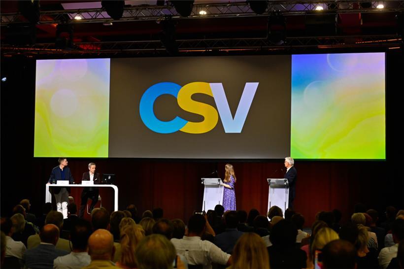 Blau, Orange-Gelb und getöntes Weiß auf schwarzem Grund: die neue Farbwelt der CSV 

