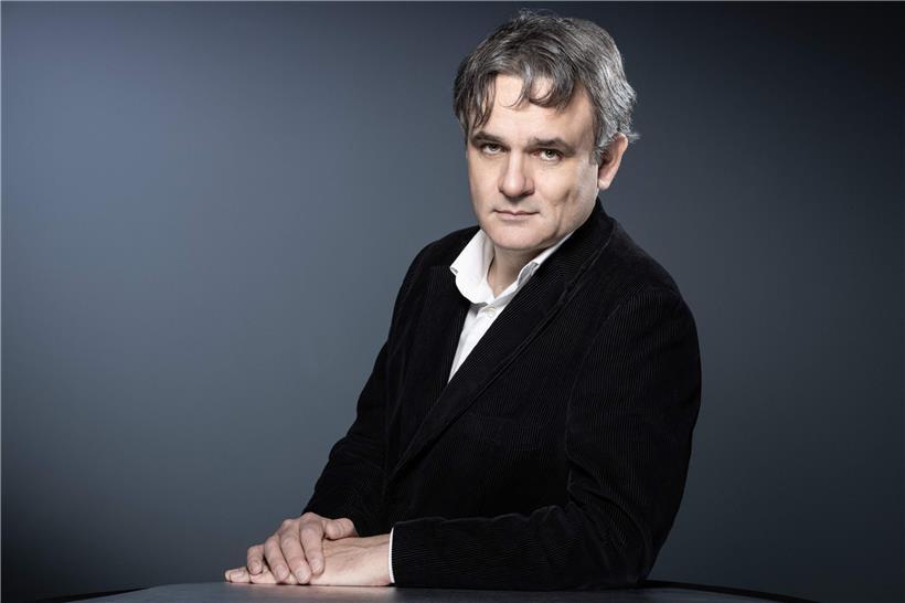 Charlie Hebdos Redaktionsleiter, Cartoonist und Redakteur Laurent Sourisseau, au...