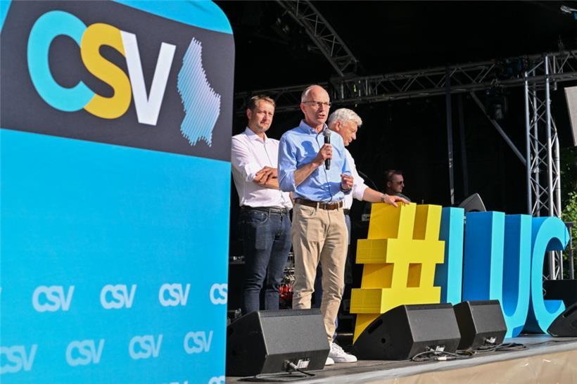 Christophe Hansen, Luc Frieden und Claude Wiseler auf der Sommerbühne
