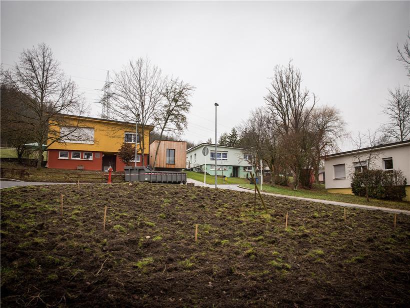 Kinderdorf Mersch mit spielenden Kindern und grünen Bäumen im Hintergrund, Archivbild der sozialen Einrichtung in Luxemburg