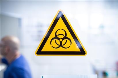 Das Symbol „Bio-Gefahr“ trifft in jeder Hinsicht auf das Coronavirus zu
