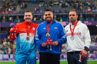 Das paralympische Podium: Tom Habscheid (Bronze), Faisal Sorour (Gold) und Aled Davies (Silber) (v.l.n.r.)
