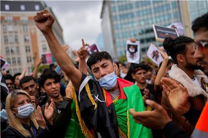 Demonstranten machen vor dem EU-Hauptquartier in Brüssel auf die Situation in Afghanistan aufmerksam
