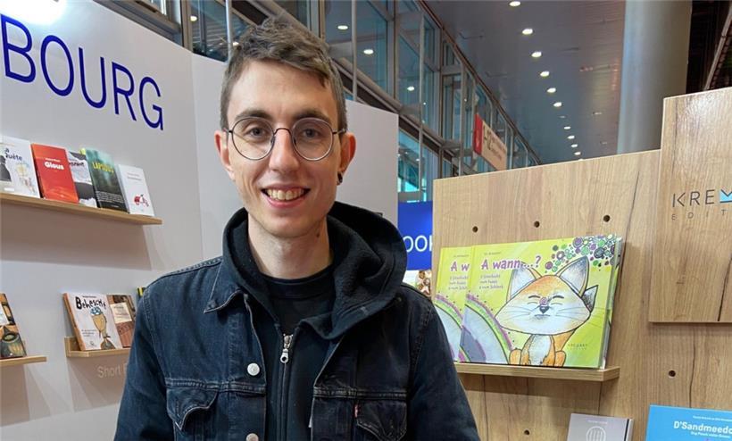 Der Autor Maxime Weber auf der Frankfurter Buchmesse 2021: Wie die anderen nationalen Neuerscheinungen war auch sein Roman auf dem Luxemburger Stand zu finden

