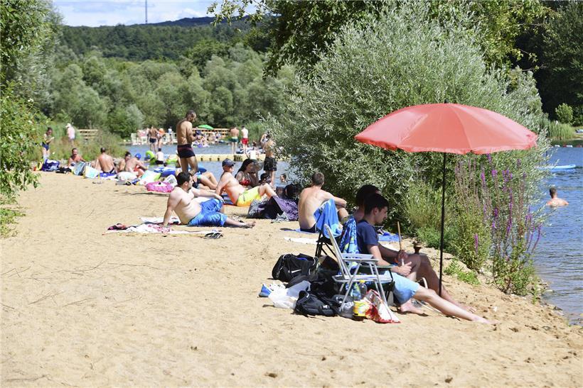 Diese Luxemburger Badeseen bieten Abkühlung Baggerweiher in Remerschen mit Sandstrand und klarem Wasser für entspanntes Strandfeeling