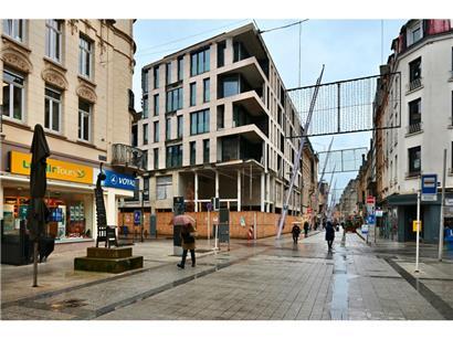 Die Bauarbeiten am ehemaligen „Scholesch Eck“ fingen vor zwei Wochen wieder an – der Bauträger steht allerdings an der Insolvenz-Schwelle
