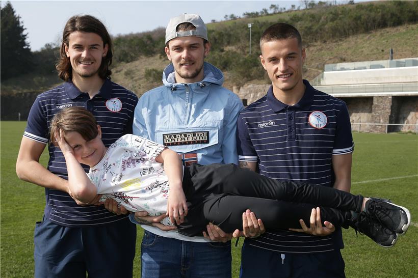 Die Familienbande: Olivier, Sébastien und Vincent (v.l.) mit Nesthäkchen Marek 
