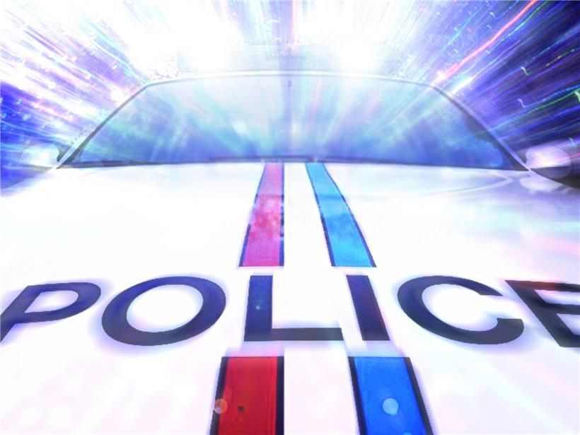 Polizeiaufruf mit rotem Warnschild, keine Anhalter mitnehmen aus Sicherheitsgründen