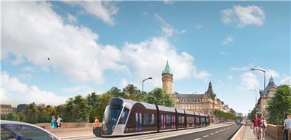 Die Tram in einer Luxtram-Grafik auf der Adolphe-Brücke. Im Hintergrund: die Avenue de la Liberté – mit freier Sichtachse bis zum Hauptbahnhof.
