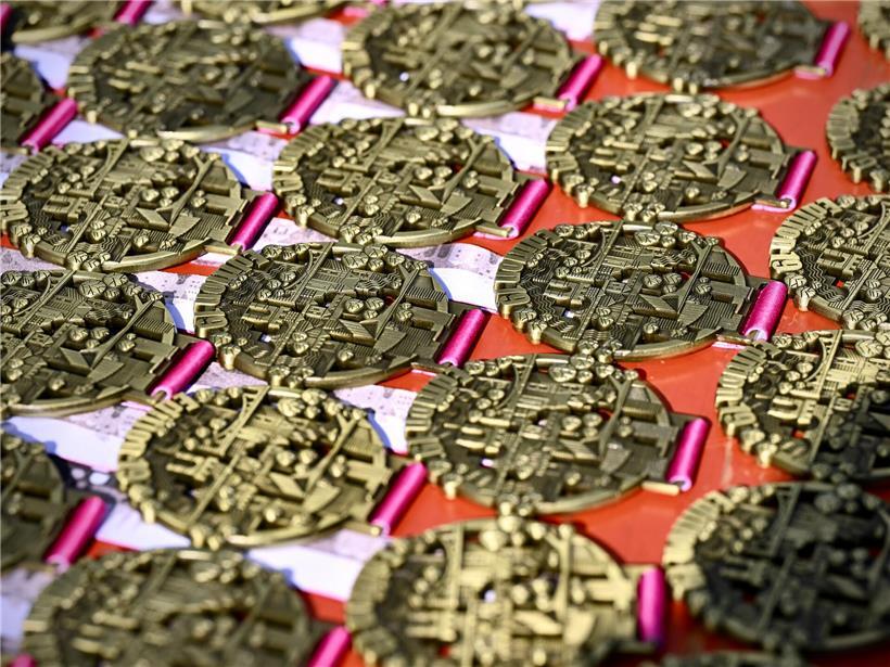 Begehrte Finisher-Medaillen in Gold, Silber und Bronze als Auszeichnung für erfolgreiche Wettkampfteilnehmer