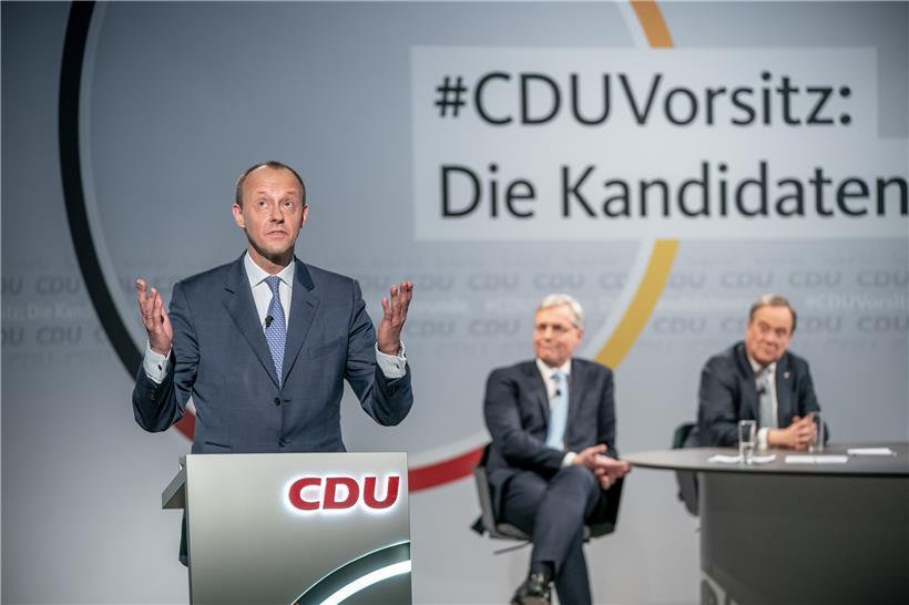 Die drei CDU-Kandidaten bei einer Diskussionsrunde: 1.001 Delegierte der Partei haben die Wahl

