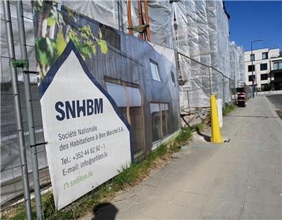 SNHBM Sozialwohnungen in Luxemburg, öffentliche Bauträger für bezahlbaren Wohnraum, modernes Wohngebäude in Stadtansicht