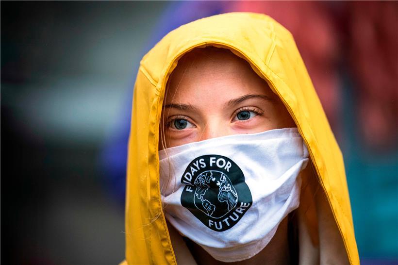 Die schwedische Klimaaktivistin Greta Thunberg steht Bürgermeister Erkki Parkkinen als Partnerin bei dessen Idee, die Sommerolympiade 2023 im finnischen Salla abzuhalten, zur Seite
