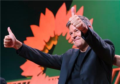 German Minister of Economics and Climate Protection Robert Habeck reacts on stage after being nominated as candidate for chancellor on the last day of the 50th Federal Delegates Conference of the Alliance 90/The Greens party (Buendnis 90 / Die Gruenen) in Wiesbaden, western Germany on November 17, 2024. (Photo by Daniel ROLAND / AFP)
