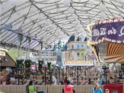 Mäertchen 2024 mit neuem Design und traditionellem Stil, symbolisch für regionale Bräuche und Feste