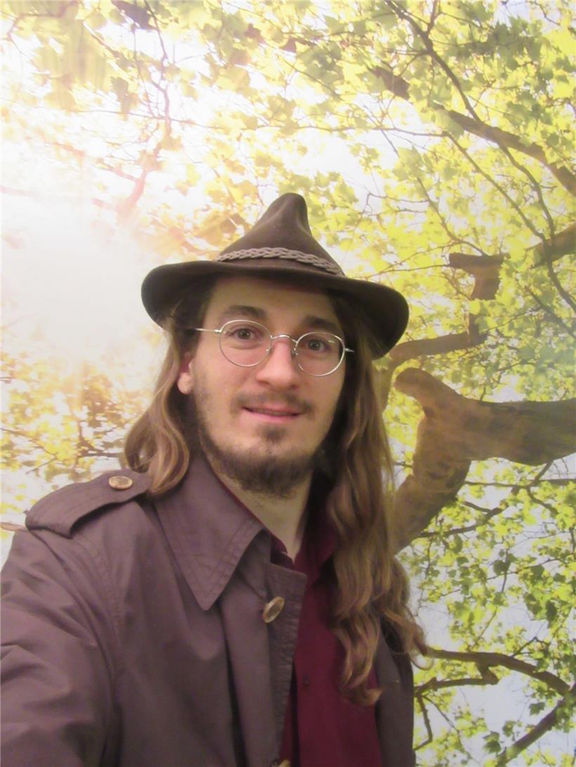 Jean Bürlesk: Self-Portrait in front of a fake tree
