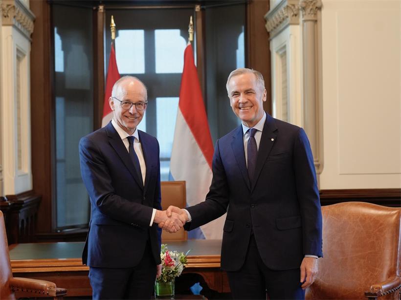 Luc Frieden und Mark Carney im Gespräch in Ottawa, Februar 2024, Thema finanzielle Stärke und Abschreckung