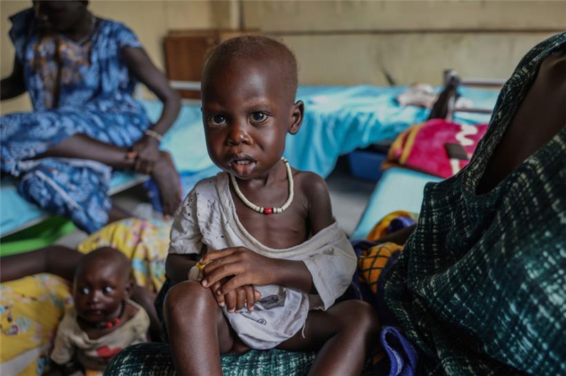 Maban im Südsudan: Adut Duor, 14 Monate alt, wird sich künftig mit kleineren Essensportionen begnügen müssen. Donald Trump braucht das Geld zur Finanzierung der Steuererleichterungen für Superreiche in den USA.
