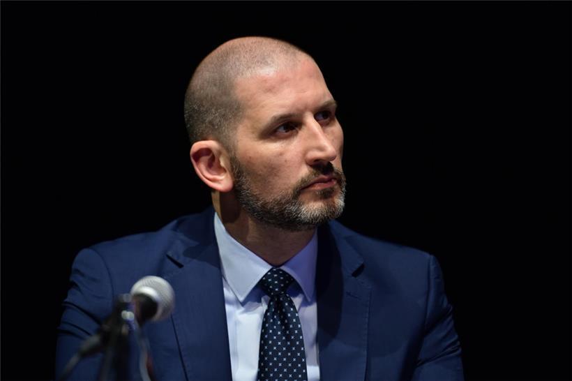 Mark Cole bei einer Podiumsdiskussion
