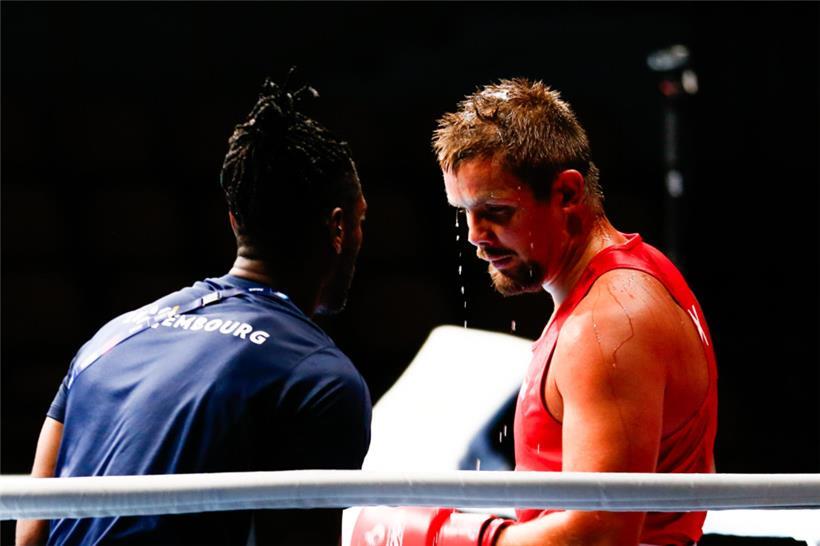 Michel Erpelding (in Rot) schied in der ersten Runde aus
