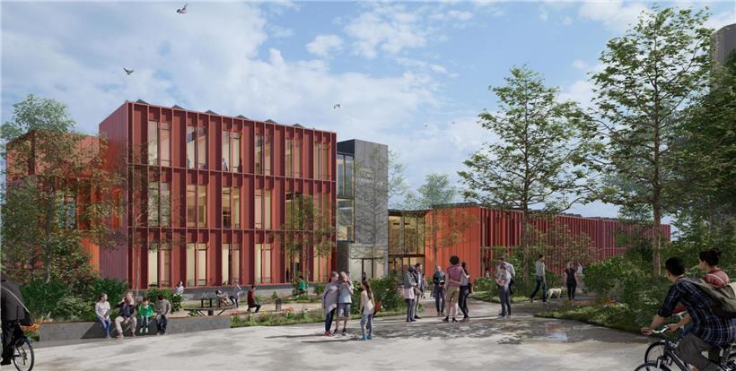 Grundschüler lernen gemeinsam auf modernem Campus mit grünen Außenanlagen und vielseitigen Lernmöglichkeiten