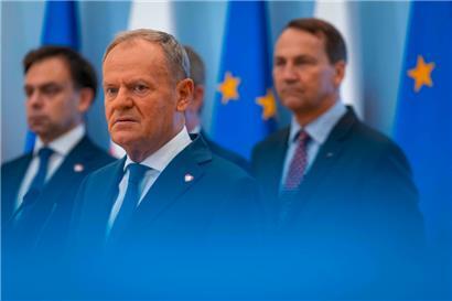 Polens Premierminister Donald Tusk (M.) versucht mit einer Regierungsumbildung neuen Schwung in die Koalition zu bringen
