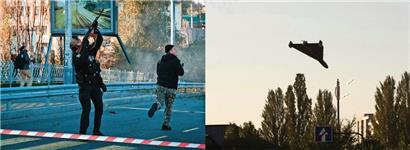 Polizisten versuchen die Drohnen abzuschießen, bevor sie einschlagen
