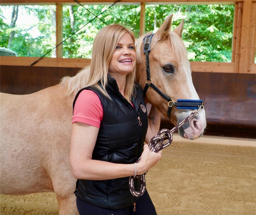 Reittherapeutin France Bergh mit Pferd Grazioso