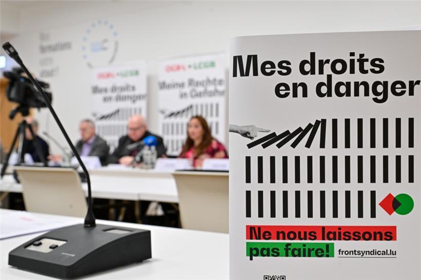 Spielt die Regierung Domino mit der Rechten der Beschäftigten? Das sehen Luxemburgs größte Gewerkschaften so – und wollen dem als Einheit entgegentreten.
