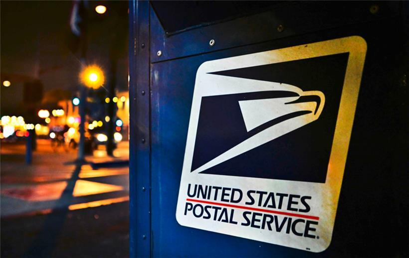 The United State Postal Service emblem is seen on the side of a mailbox in Monterey Park, California on February 4, 2025. The US Postal Service (USPS) said February 4, 2025 it was temporarily suspending inbound parcels from China and Hong Kong, shortly after President Donald Trump’s imposition of fresh tariffs targeting Beijing. The halt…
