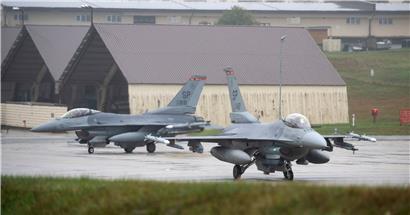 U.S. Air Force F-16 Fighting Falcons taxi toward a runway during a Show of Forces event at Spangdahlem Air Base, Germany, Oct. 1, 2019. The aircraft, assigned to the 480th Fighter Squadron, participated in the training event to show the 52nd Fighter Wing’s ability to generate a large number of aircraft during a survival or…
