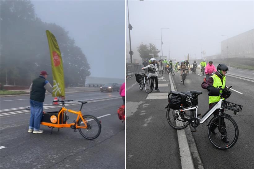 Verkehrsaktion am frühen Morgen: Ein Fahrradfahrer hält kurz die Autos an, damit die anderen über eine Fahrspur der „Rout Bréck“ fahren können
