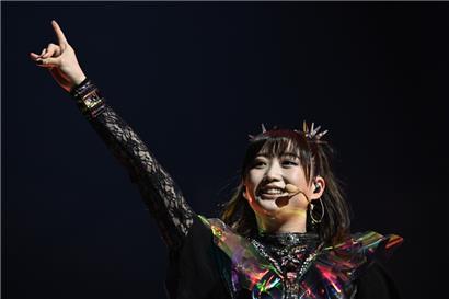 Welcome, Momometal! The new member of the group was all smiles at Rockhal.
