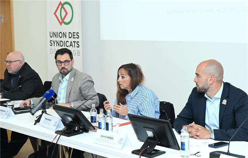 Patrick Dury, Christophe Knebeler, Nora Back und David Angel verteidigen solidarische Gesundheitsversorgung mit gewerkschaftlichen Mitteln.