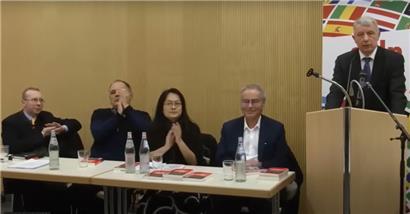 „Wollte nicht fragen, wer da sitzt“: Ganz links applaudiert Alain Escada von der rechtsextremen Partei Civitas, ganz rechts am Rednerpult steht Fernand Kartheiser
