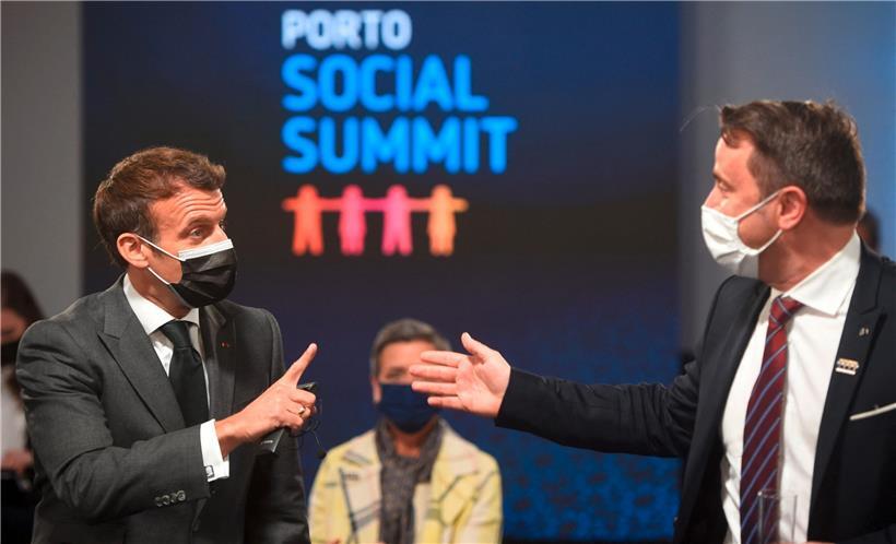 Xavier Bettel, hier im Gespräch mit Frankreichs Präsident Emmanuel Macron, war zum Gipfel nach Porto gereist
