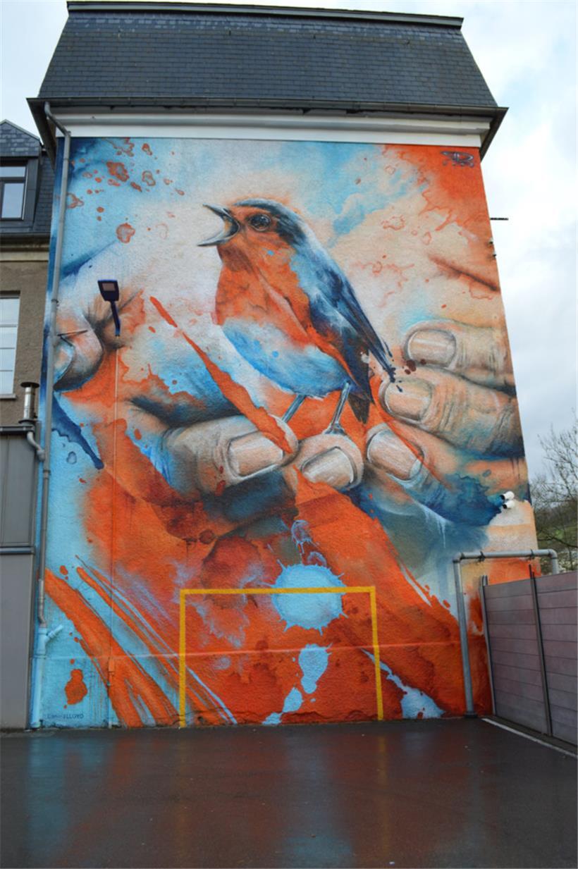 Zusammen mit lokalen Künstlern bringt Ettelbrück an manchen Gebäuden Farbe ins Spiel
