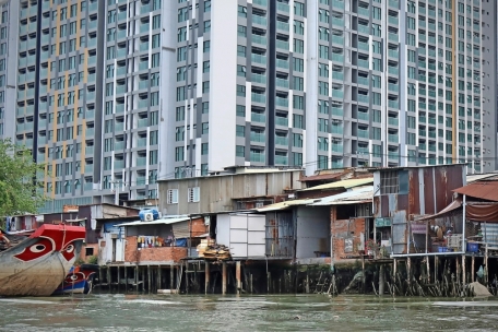 Am Saigon-Fluss prallen Arm und Reich aufeinander