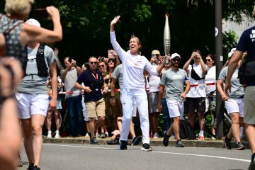 Olympische Flamme / Schengen feiert den historischen Moment
