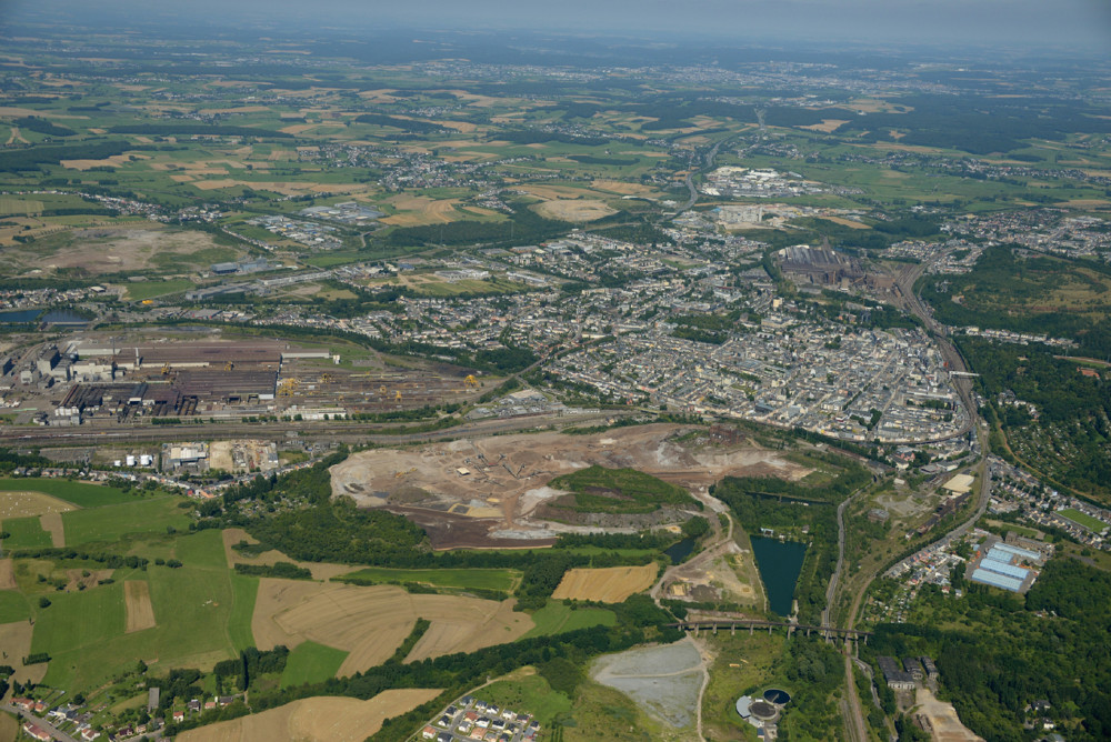 Geschichte von Esch / Wie sich die eingekesselte Industriemetropole zur grenzüberschreitenden Pilotstadt entwickelt hat