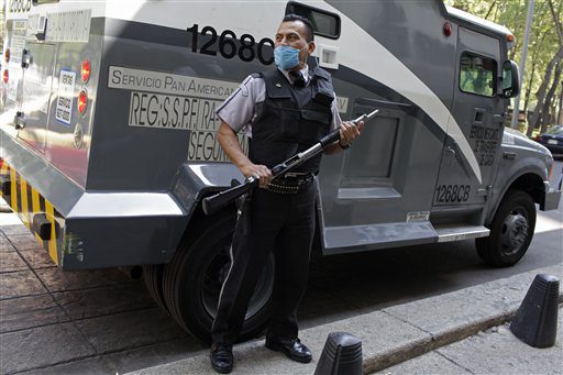 Grippe porcine: Mexico ferme ses cafés et restaurants